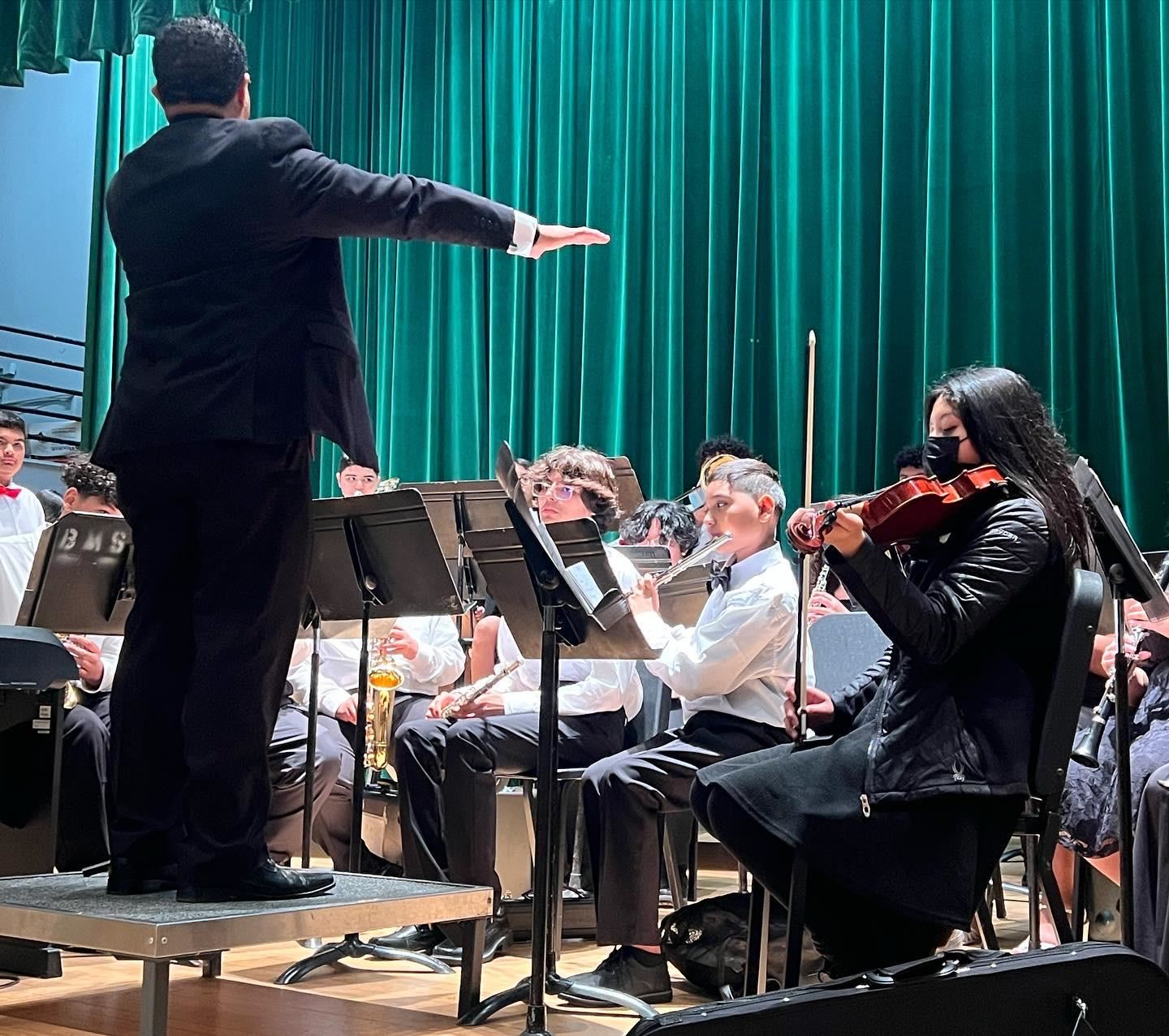 Mr. Glenn directing the orchestra