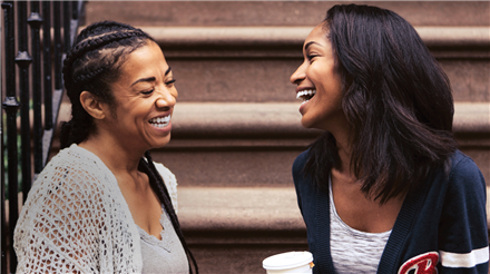  mom and daughter smiling