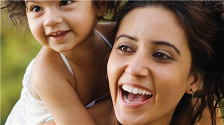  child woman smiling