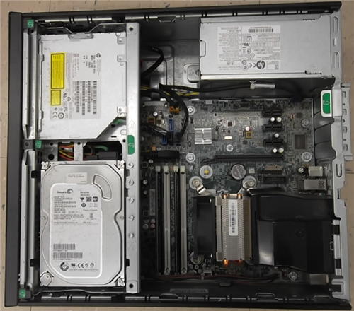 Picture of CPU with cover removed so that we may see inside.