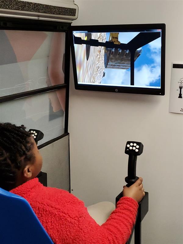 Student working with simulator