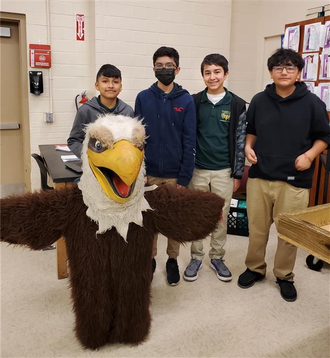 Eagle Bots Robot Performance Team with the Eagle Mascot