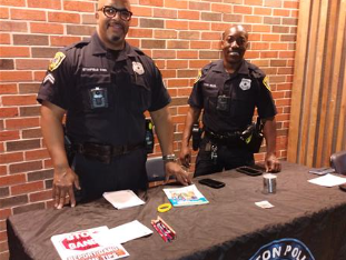 Officers Standfield, and Shaw join in for Meet the Teacher Night to share some amazing information about youth programs that HPD offers