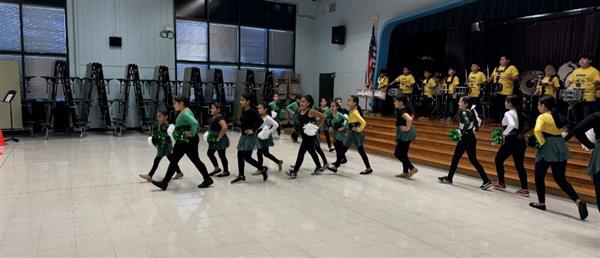 Dance Line and Drum Line Performing